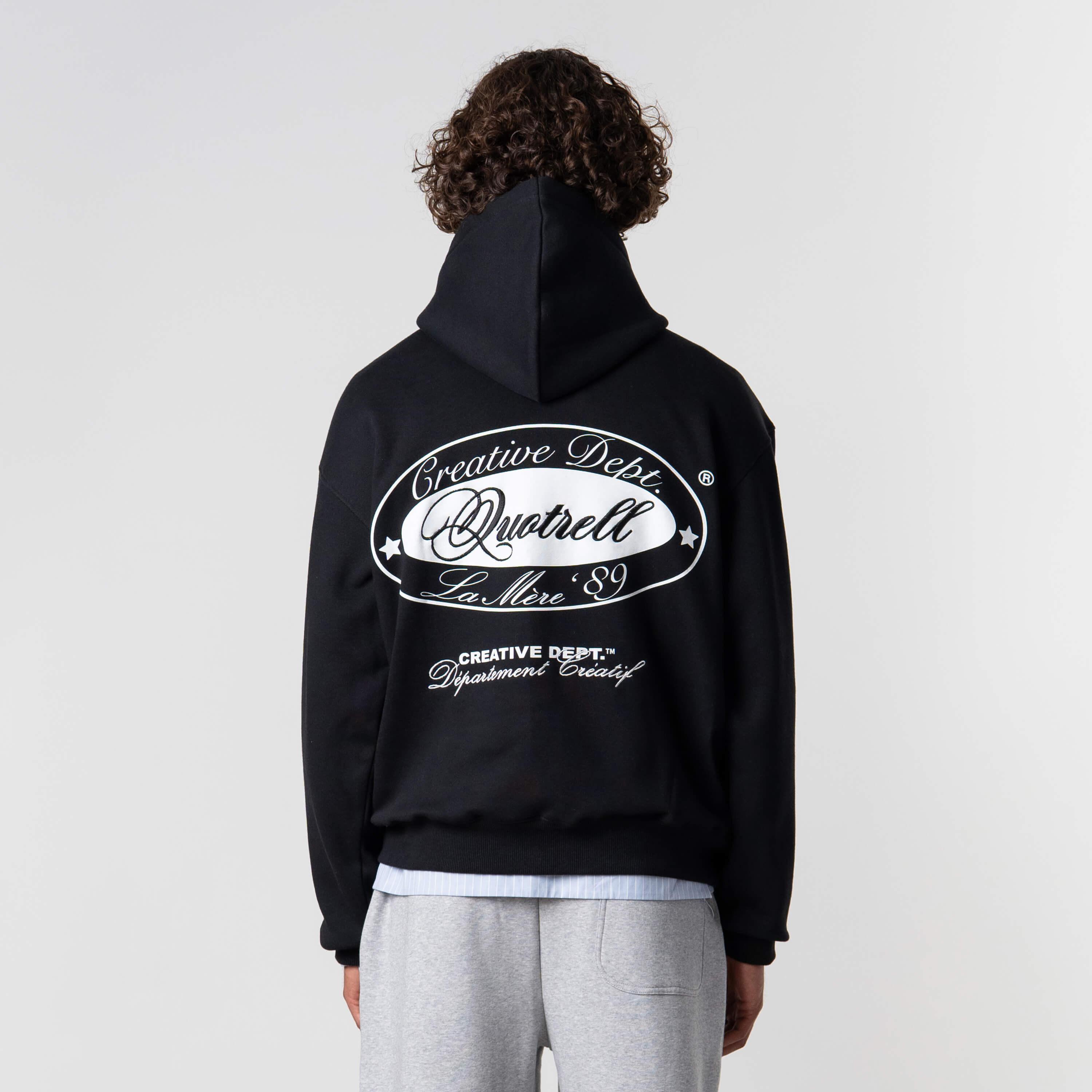 Model is 184 cm, 70 kg, and wears size M