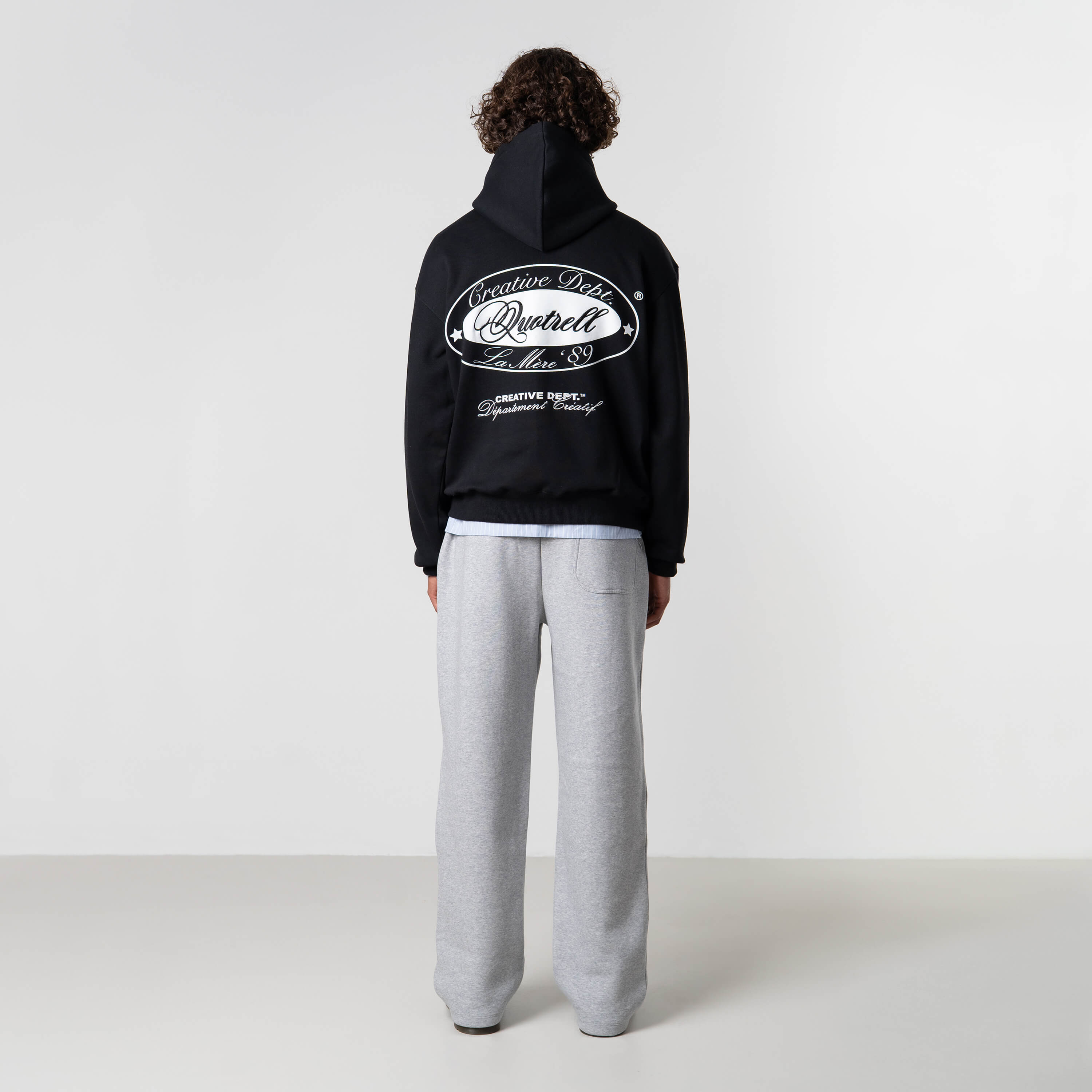 Model is 184 cm, 70 kg, and wears size M