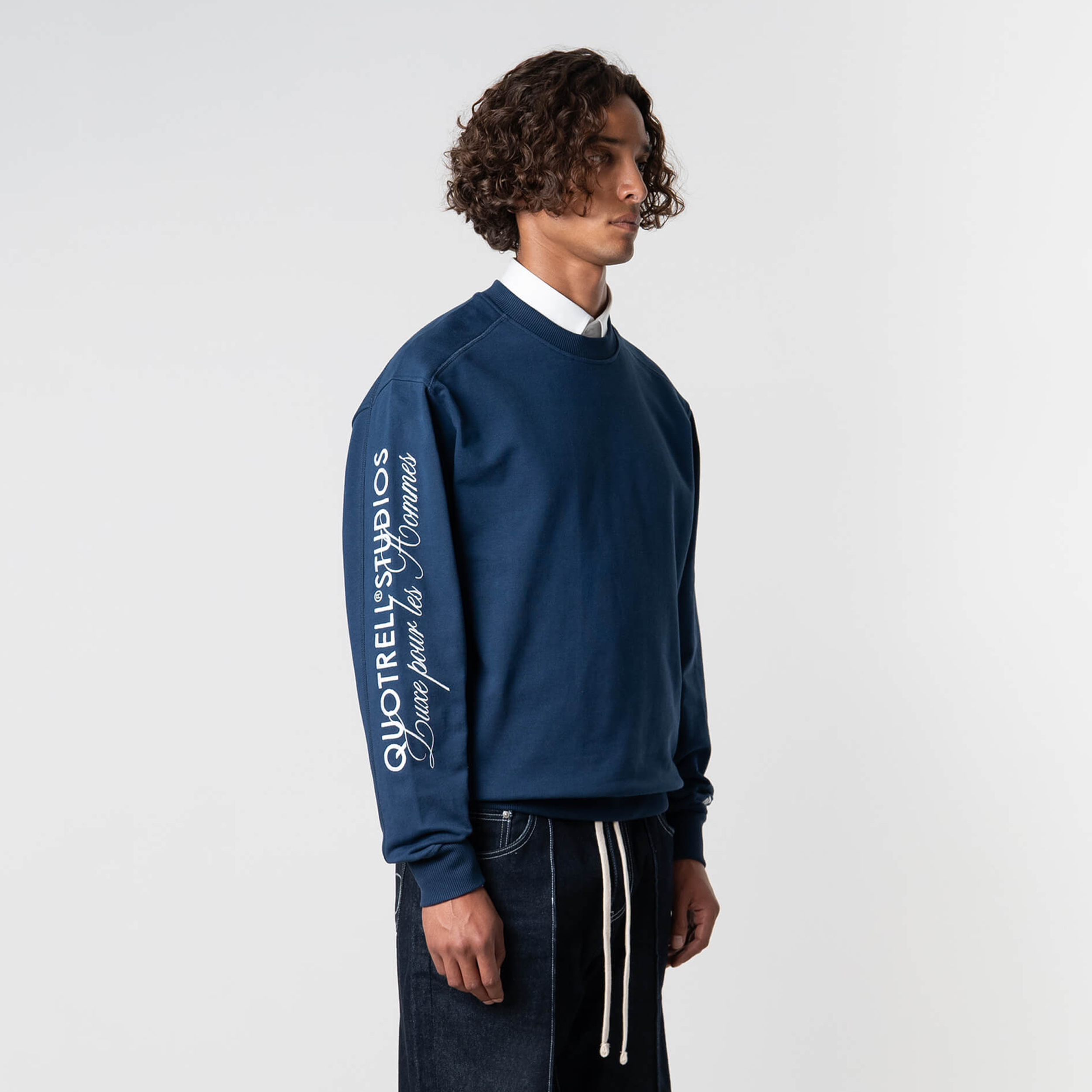 Model is 184 cm, 70 kg, and wears size M