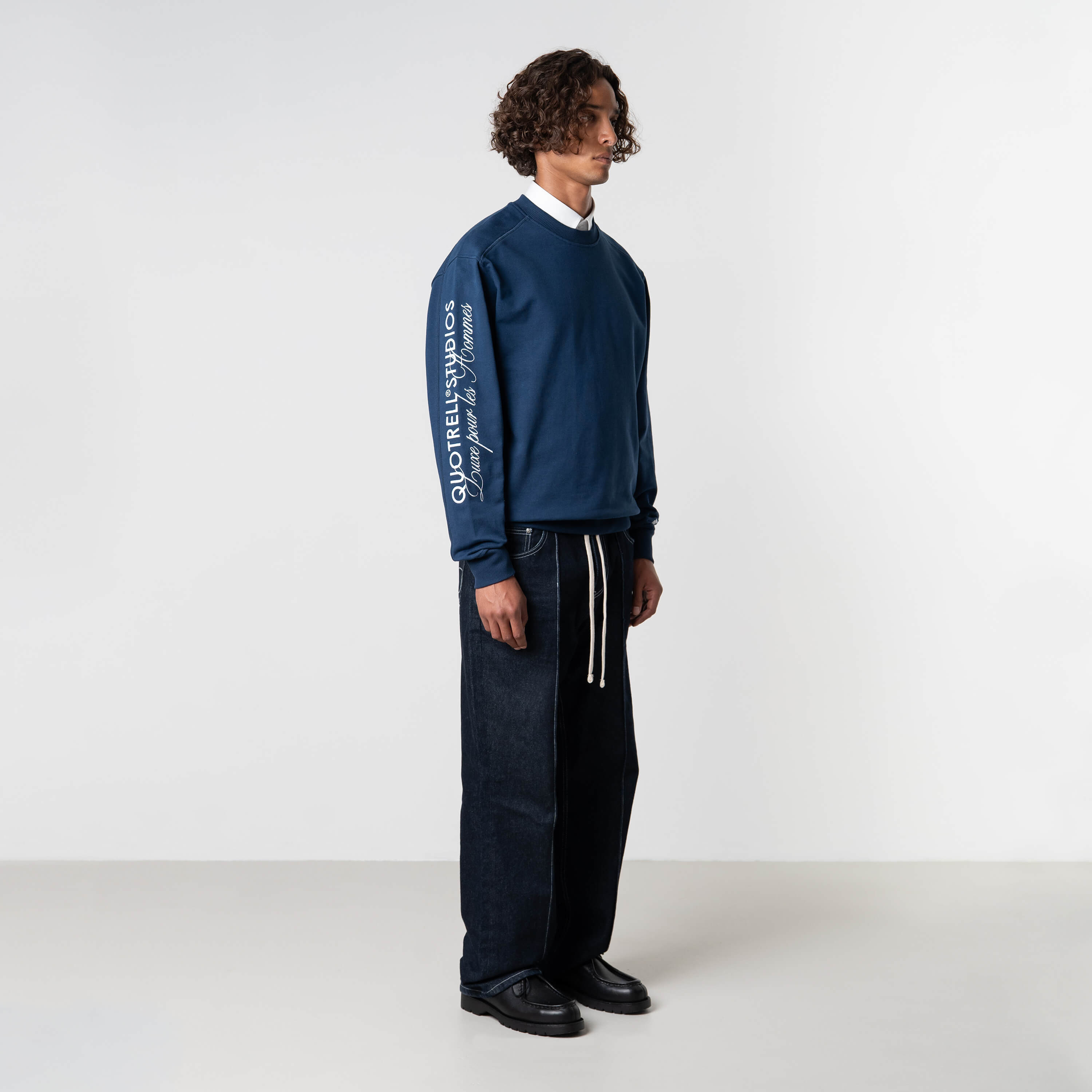 Model is 184 cm, 70 kg, and wears size M