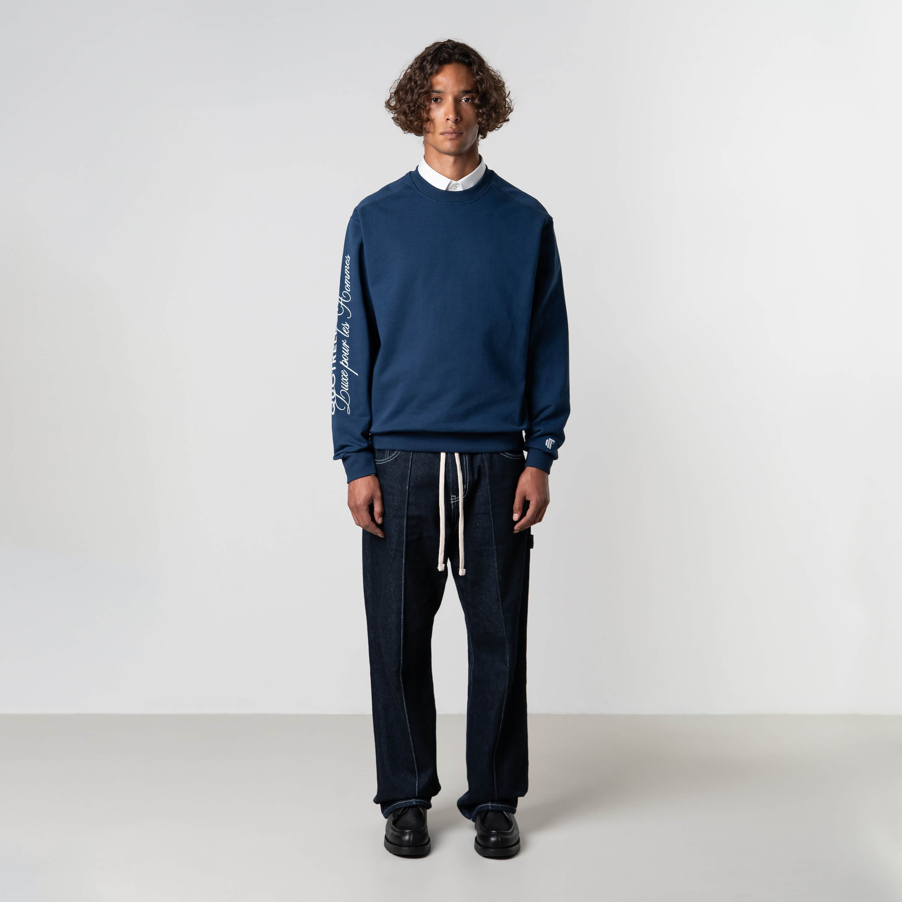Model is 184 cm, 70 kg, and wears size M