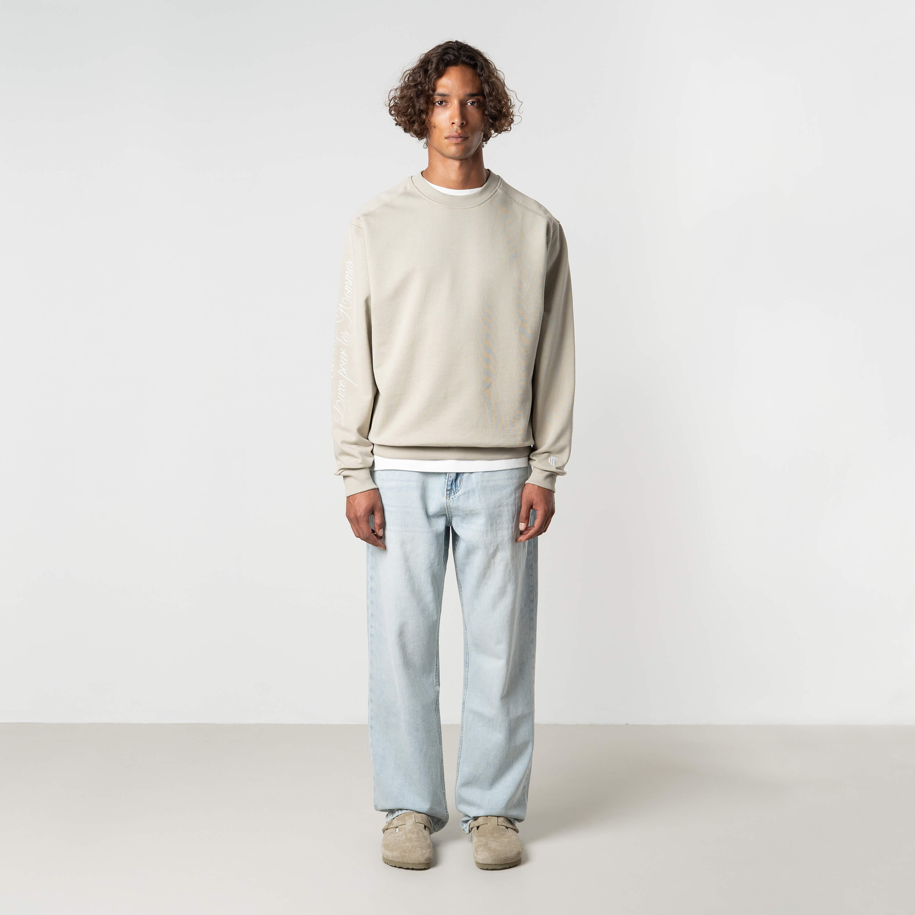 Model is 184 cm, 70 kg, and wears size M