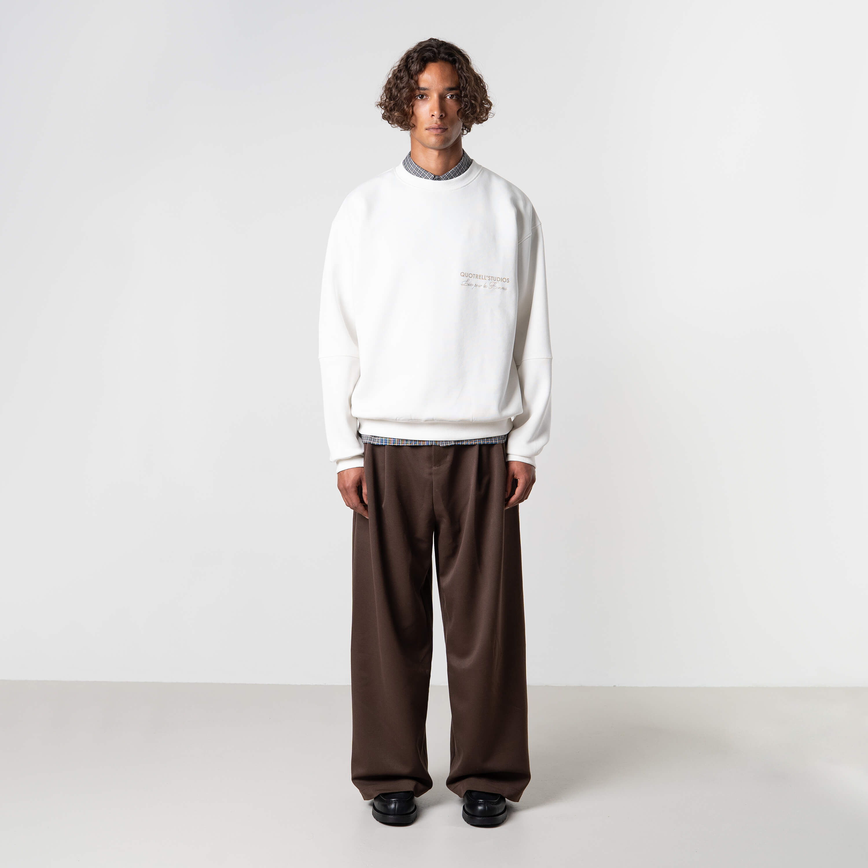 Model is 184 cm, 70 kg, and wears size M
