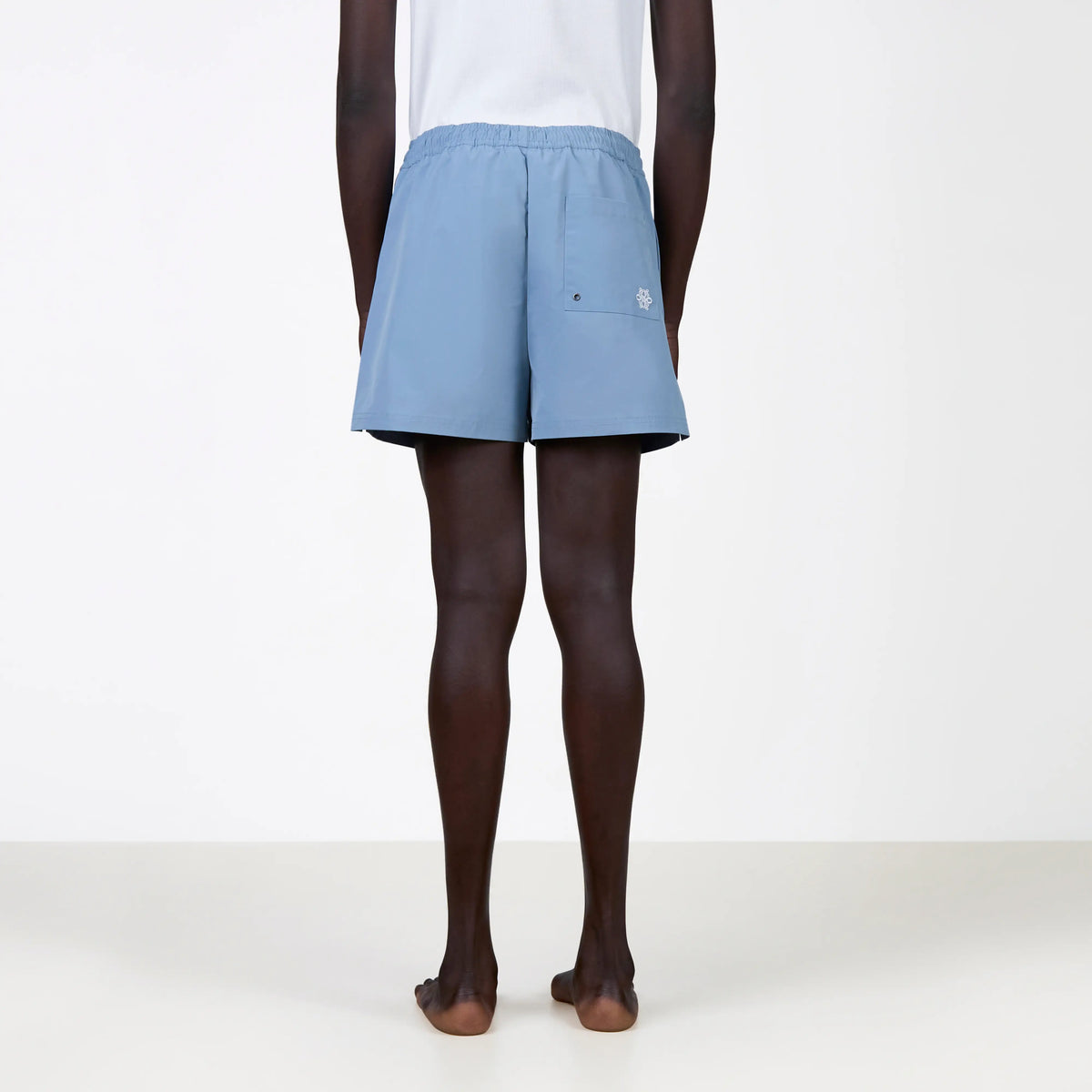 Chain Swimshort in muted blue and red