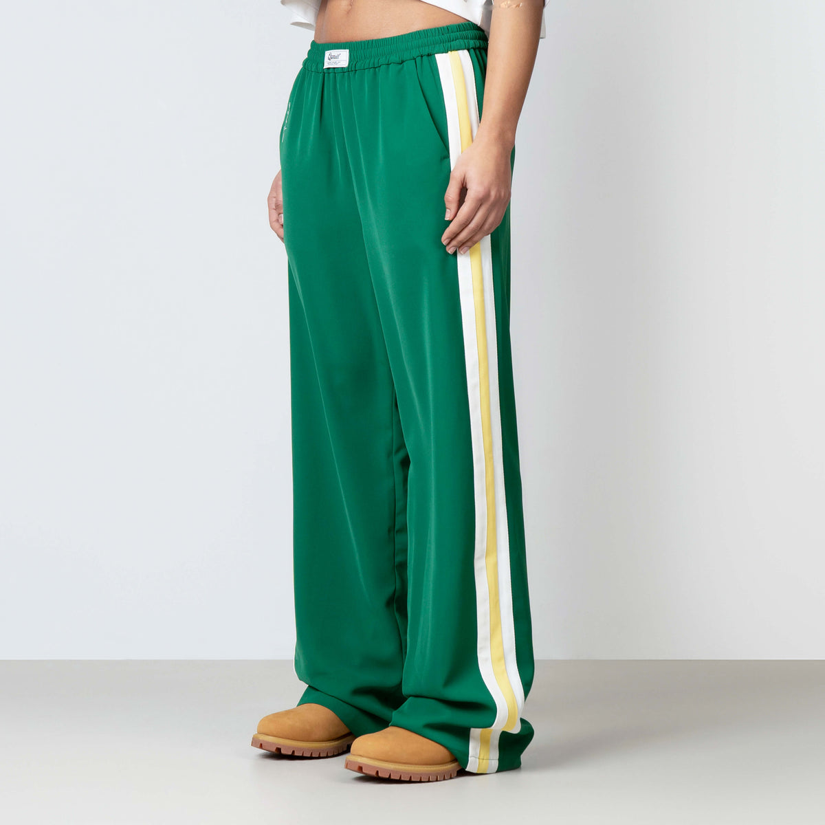 Eva Pants in green and yellow, front view